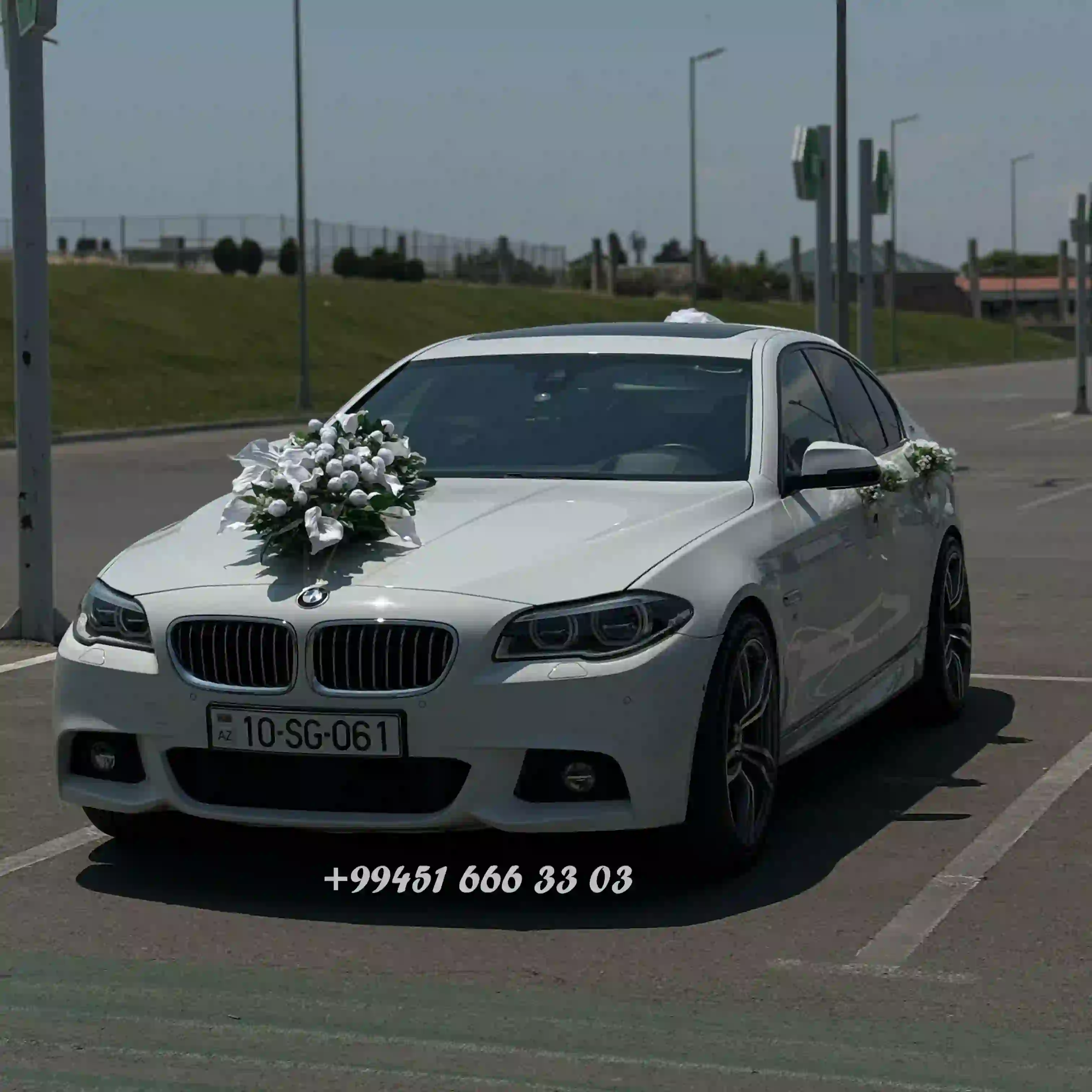 Maşın bəzəyi ağ tonlar